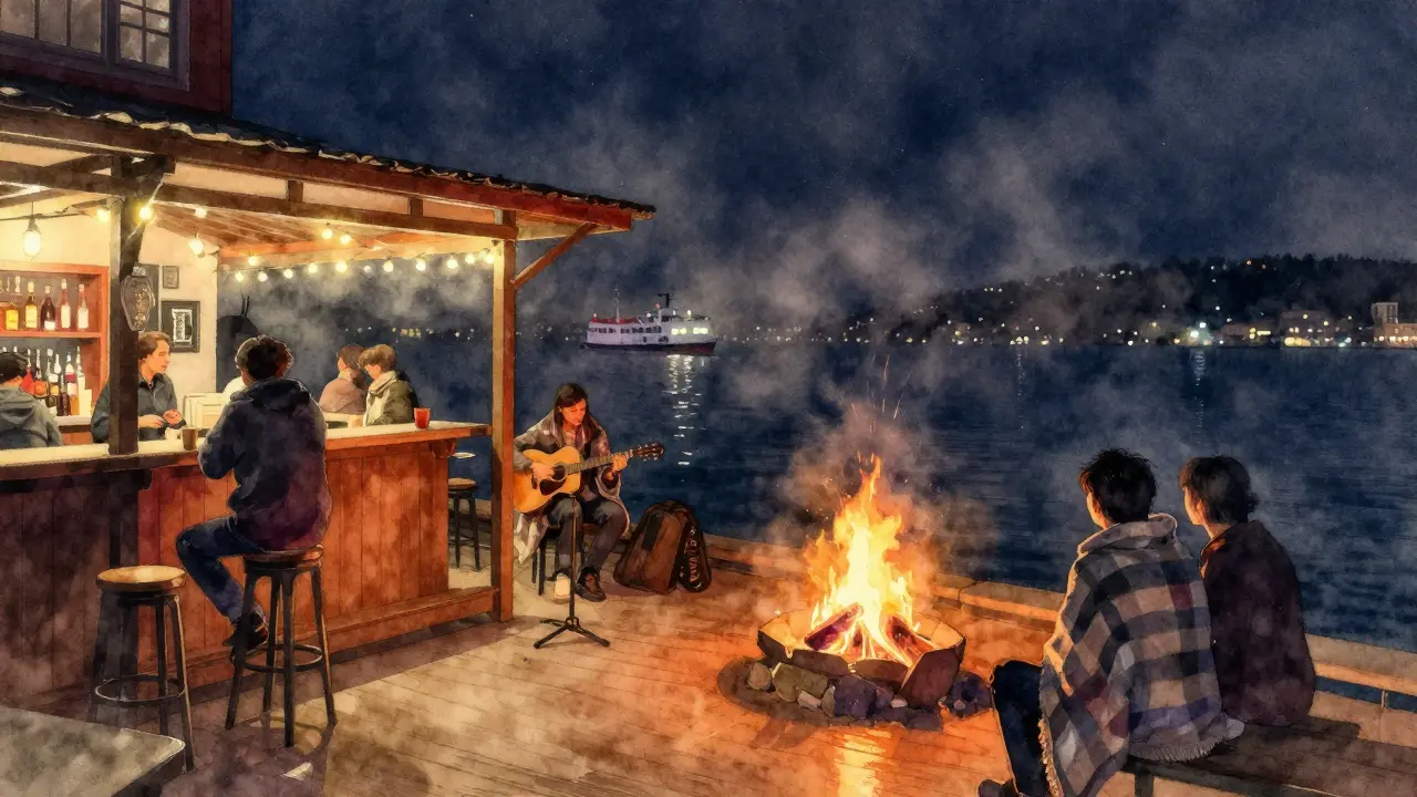 Cozy waterside bar at Bebek with bonfire and acoustic music under starry night skies.
