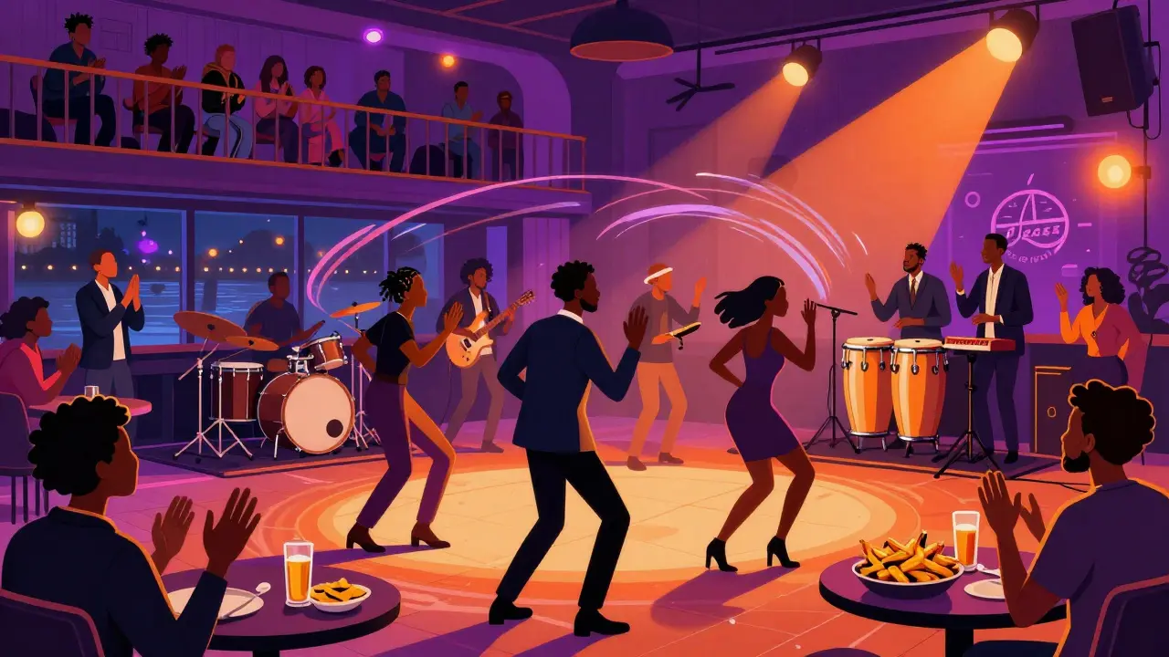 Diverse crowd dancing at The Jazz Café under neon lights to Afrobeat music at night.
